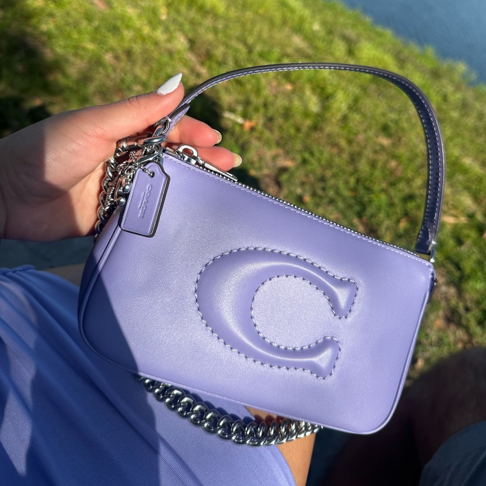 Coach Nolita 19 in light Violet with signature quilting.